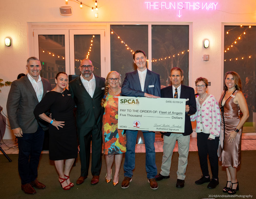 South Florida SPCA Board of Directors presents donation to Fleet of Angels.