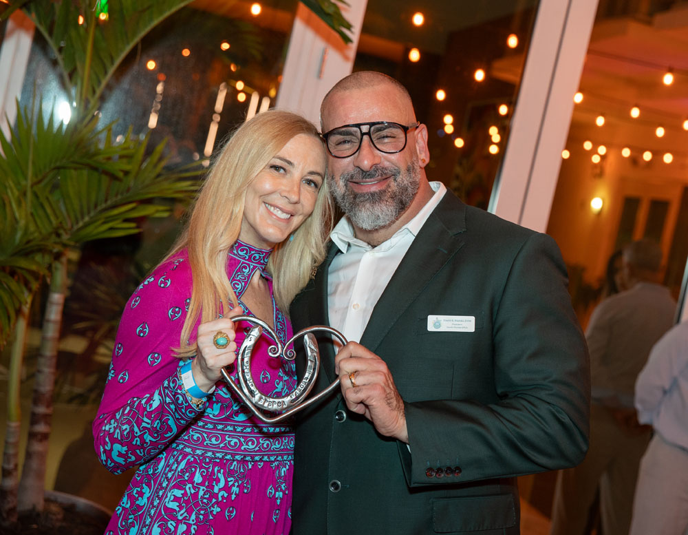 Angela Birdman, Co-host, with Dr. David Bialski, President.